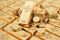Цена на золото по итогам вечернего межбанковского фиксинга в Лондоне в пятницу понизилась
